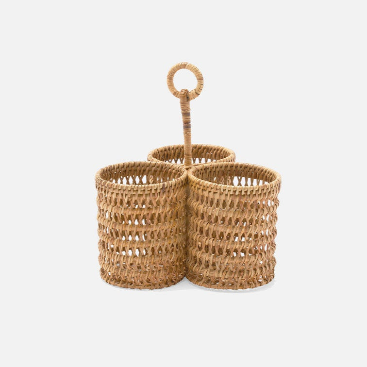Woven wine basket with a handle on a background
