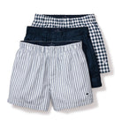 Three pairs of men's underwear with different patterns on a white background