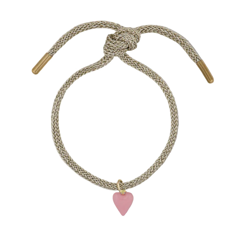 Bracelet with pink heart charm on a white background