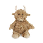 Plush toy highland cow on a white background