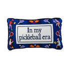 Decorative pillow with pickleball-themed design and text on a white background