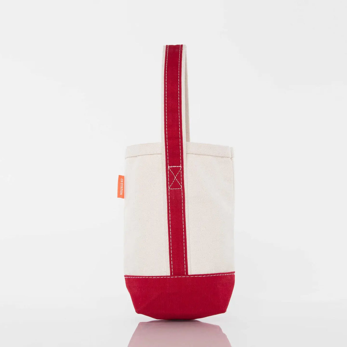White tote bag with red accents on a white background
