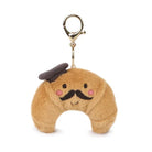 Plush keychain shaped like a crescent moon with a face and mustache on a white background