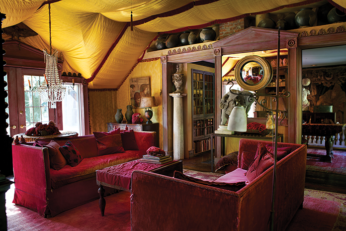 The apartment above the shop contains 19th-century Italian sofas in their original red velvet, an Oushak carpet and a collection of Mexican water jars. Trapp hung the walls and ceilings with 18th-century Imperial Chinese silk and mixed ash with paint to achieve the look of antique paneling.