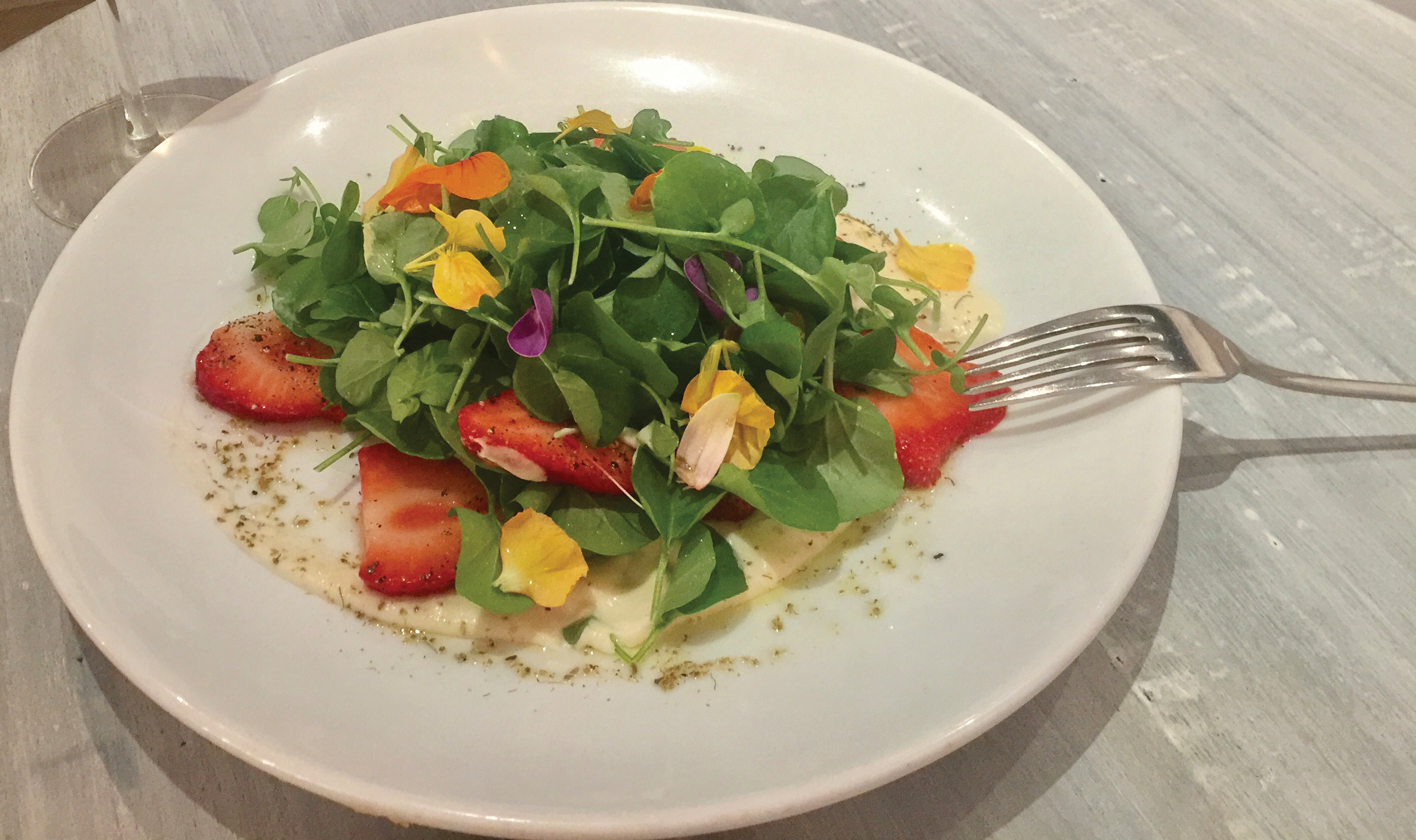โI am a big fan of the classic spinach and strawberry salad that we serve in late spring through summer at The Cottage,โ says Lewis.