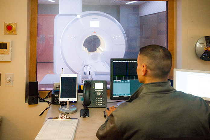 Man using machine at Phelps Hospital