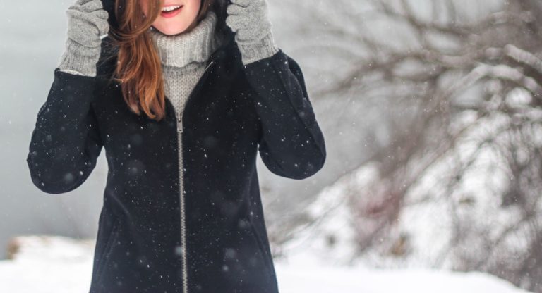 Winter scene with girl in snow