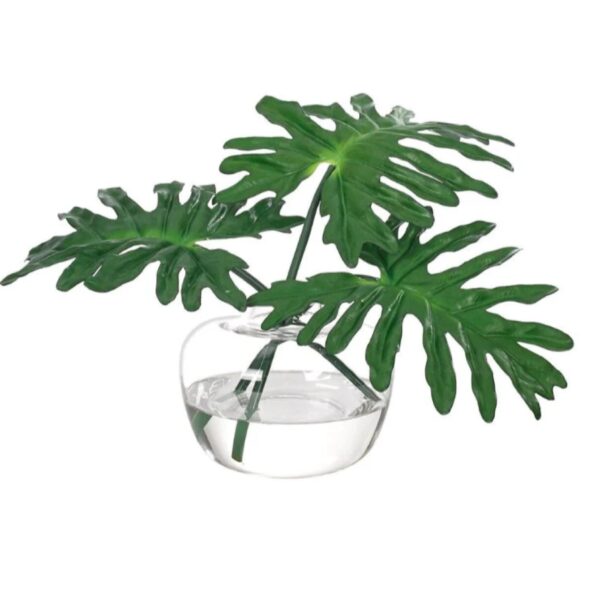fake plant in a pot of water